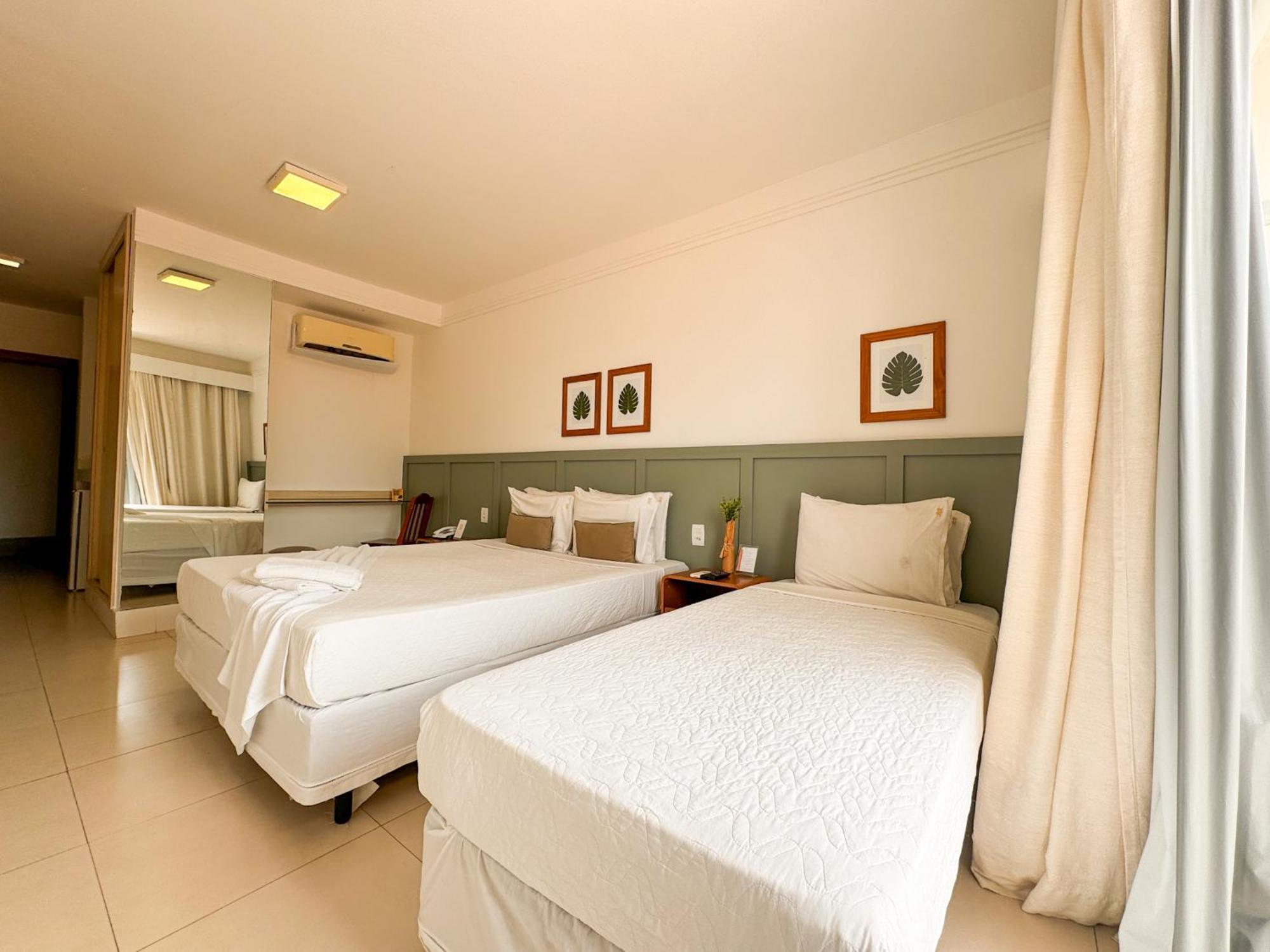 Quarto Triplo com Vista Lago